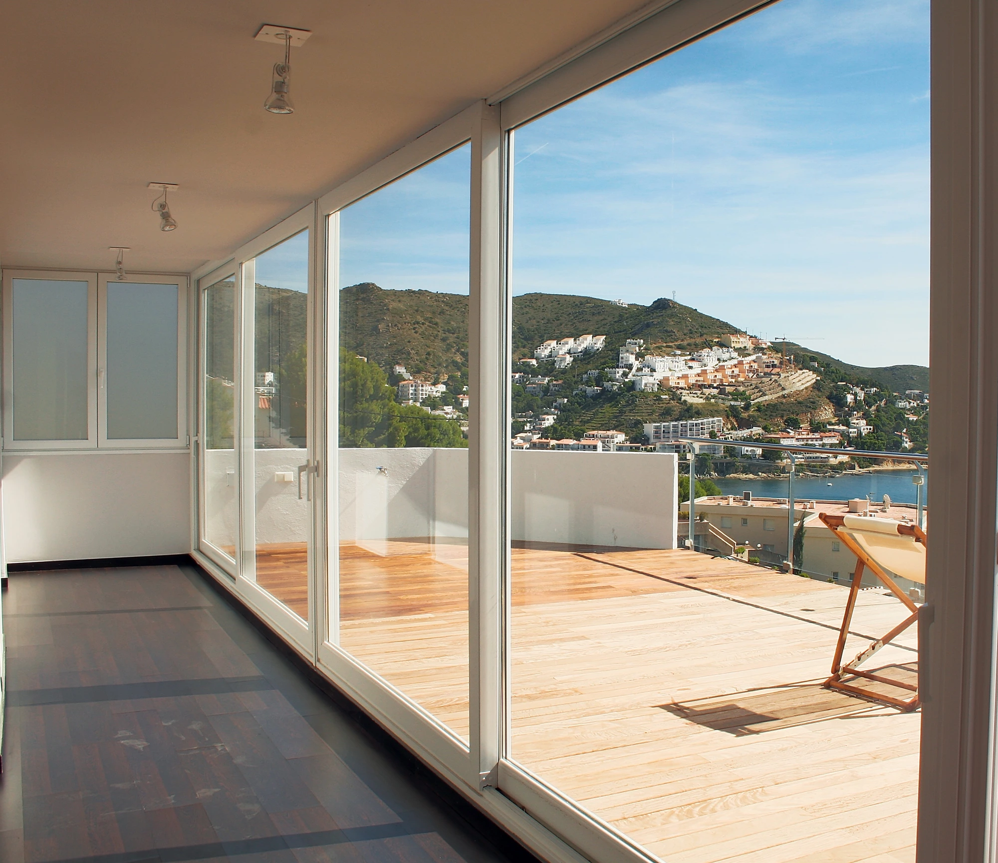 SOHOM sliding doors opening to a terrace view